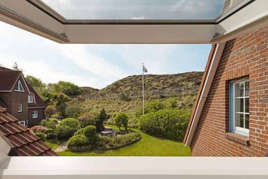 Ausblick in den Garten von Schlafzimmer zwei