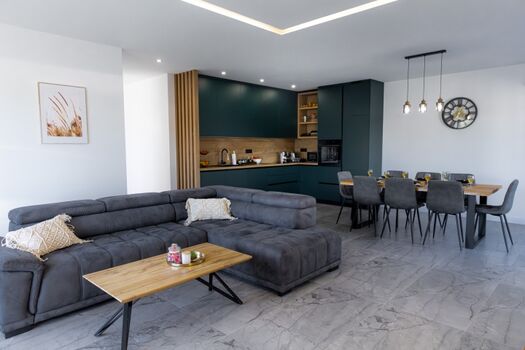 The living room sofa easily converts into an extra bed, accommodating additional guests.