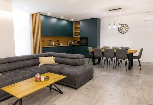 Enjoy the calm and warmth of the living space during the nighttime hours.