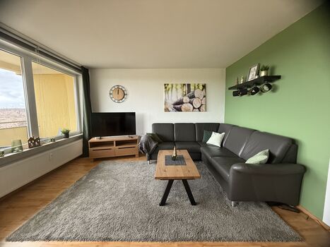 Wohnzimmer mit Schlafsofa