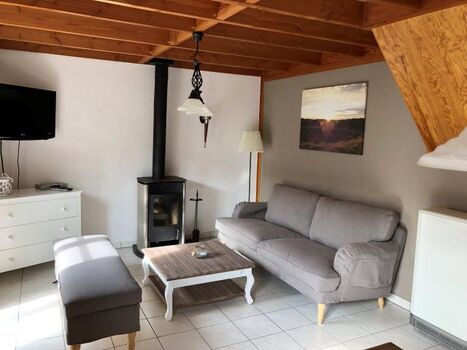 Wohnzimmer mit Nachtspeicherofen