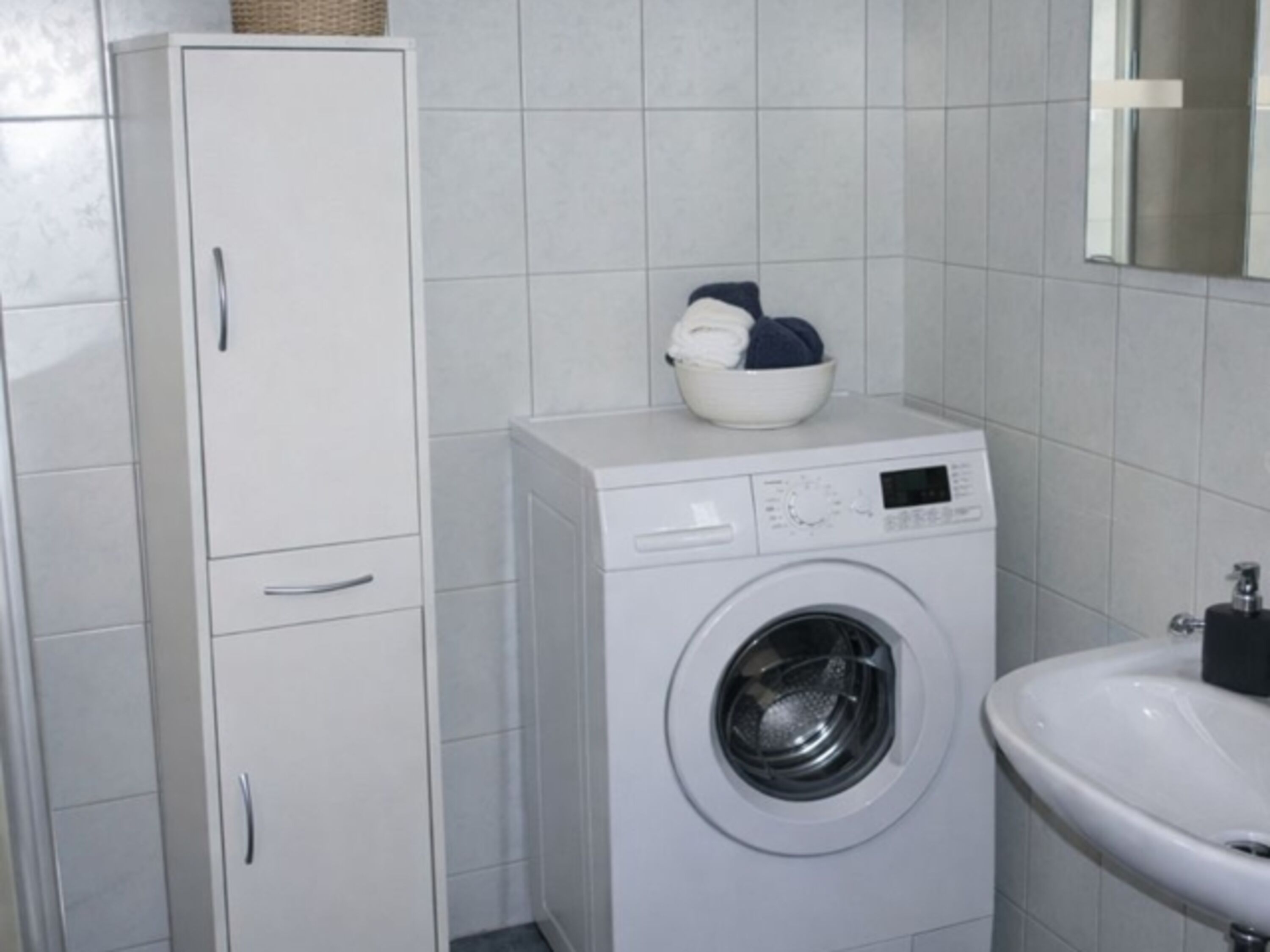 Duschbad mit Waschmaschine