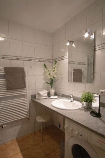 Duschbad mit Waschmaschine