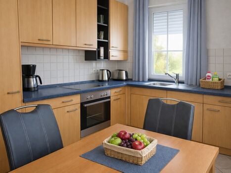 Küche mit Spülmaschine u. Backofen 