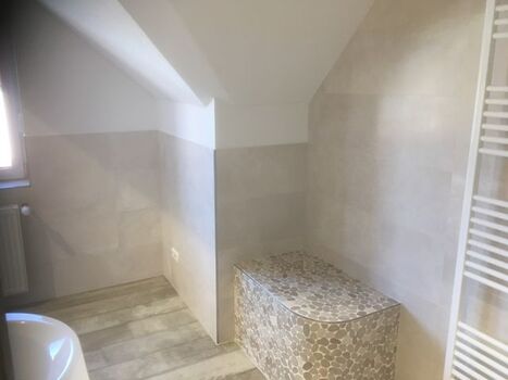 Sitzbank mit Fußbodenheizung