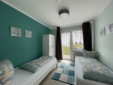 3. Schlafzimmer im OG mit 2 Einzelbetten 90x200