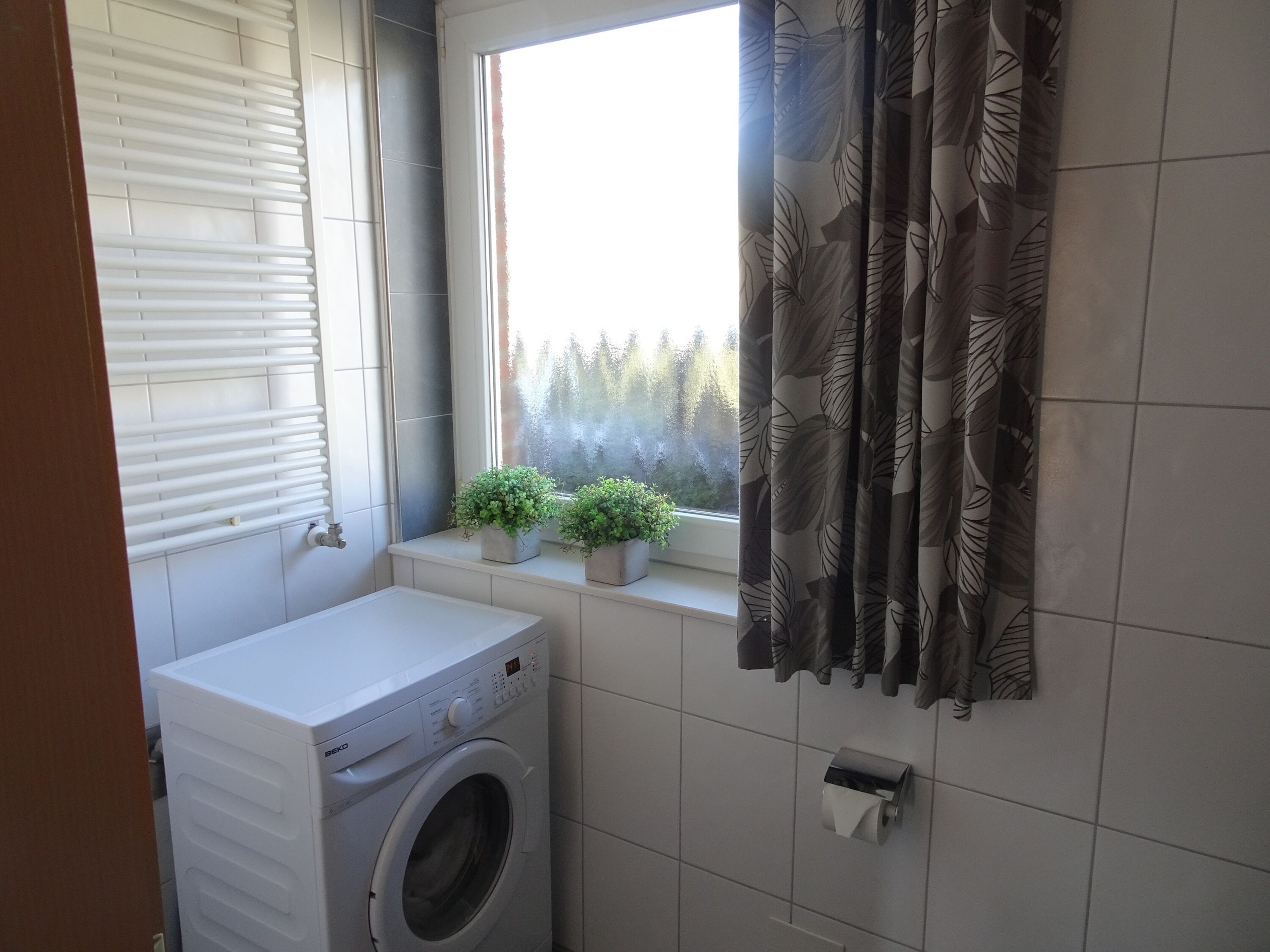 Duschbad mit Waschmaschine