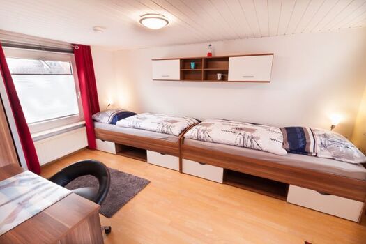 Schlafzimmer mit Einzelbetten