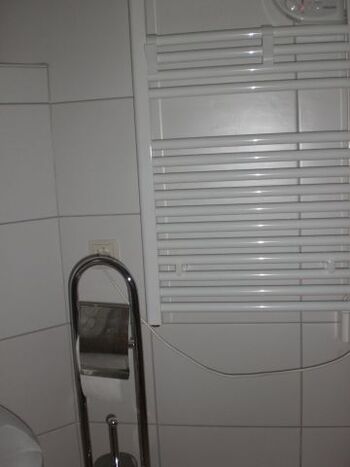 Handtuchtrockner und Heizung in Bad unten