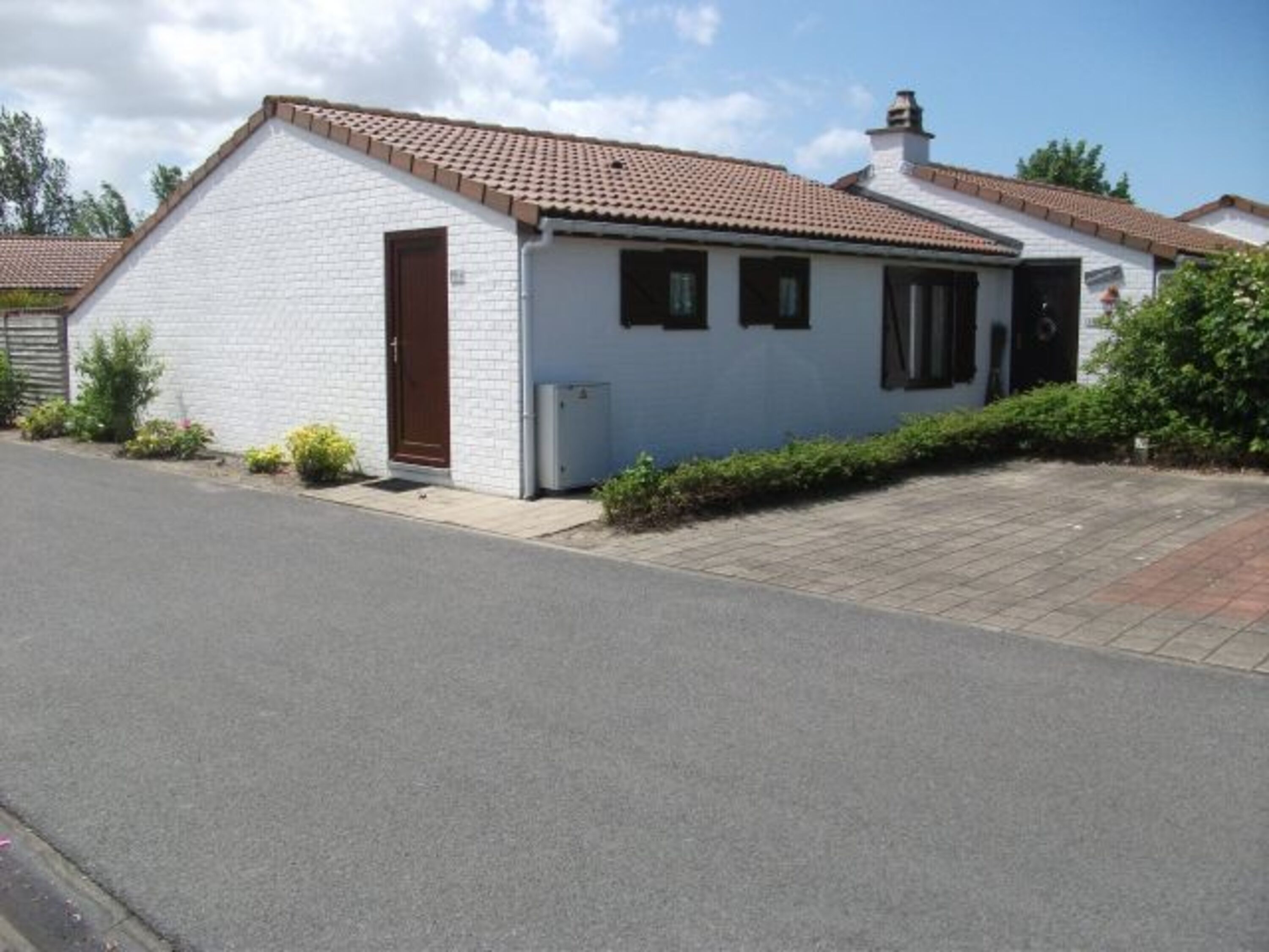 Haus aus Sicht des Parkplatzes