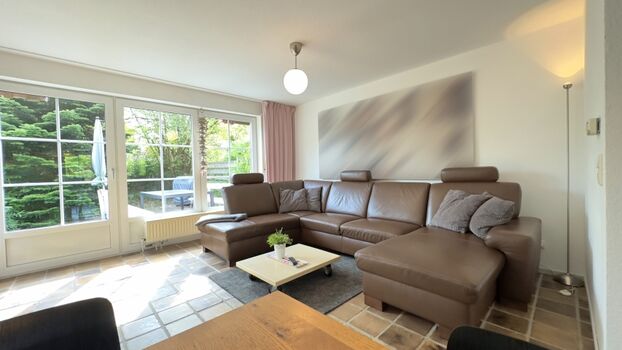 Haus Strand Wohnbereich mit Ledersofa