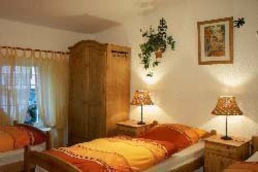 Kutscherhaus Casa Chabeli - Schlafzimmer