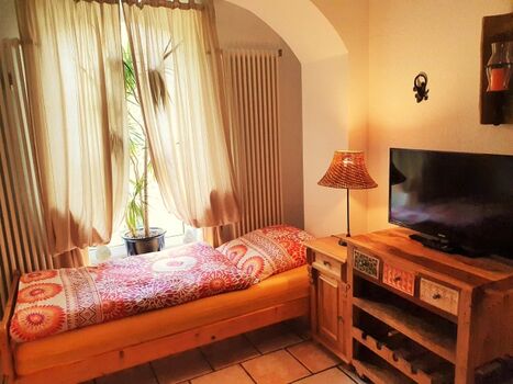 Kutscherhaus Casa Chabeli - Schlafzimmer