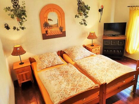 Kutscherhaus Casa Chabeli - Schlafzimmer