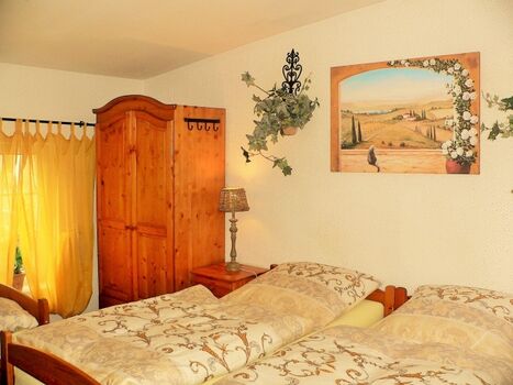 Kutscherhaus Casa Chabeli - Schlafzimmer