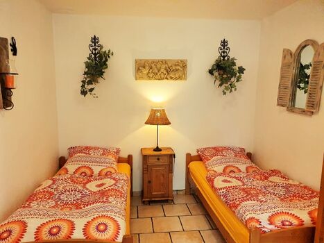 Kutscherhaus Casa Chabeli - Schlafzimmer