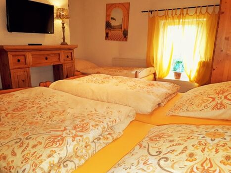 Kutscherhaus Casa Chabeli - Schlafzimmer