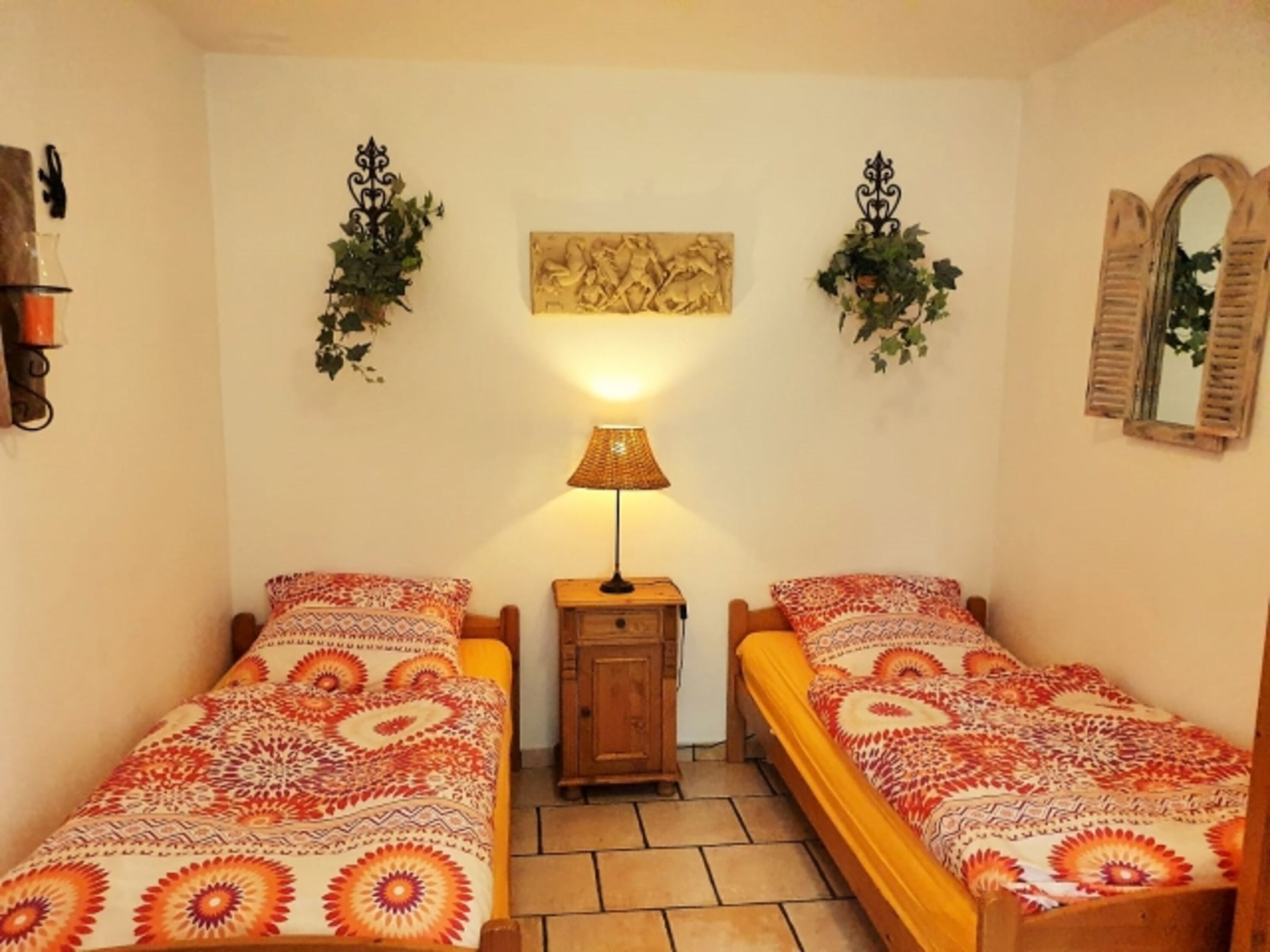 Kutscherhaus Casa Chabeli - Schlafzimmer