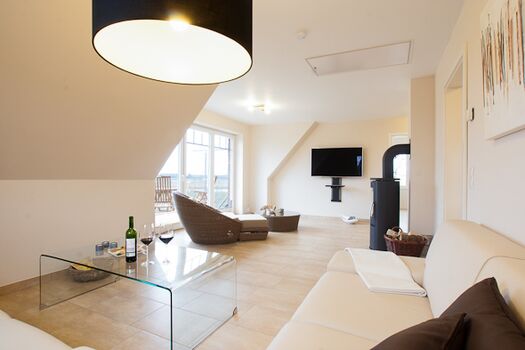 Wohnzimmer mit Kaminofen 