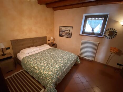 das 1.e Schlafzimmer im Erdgeschoss