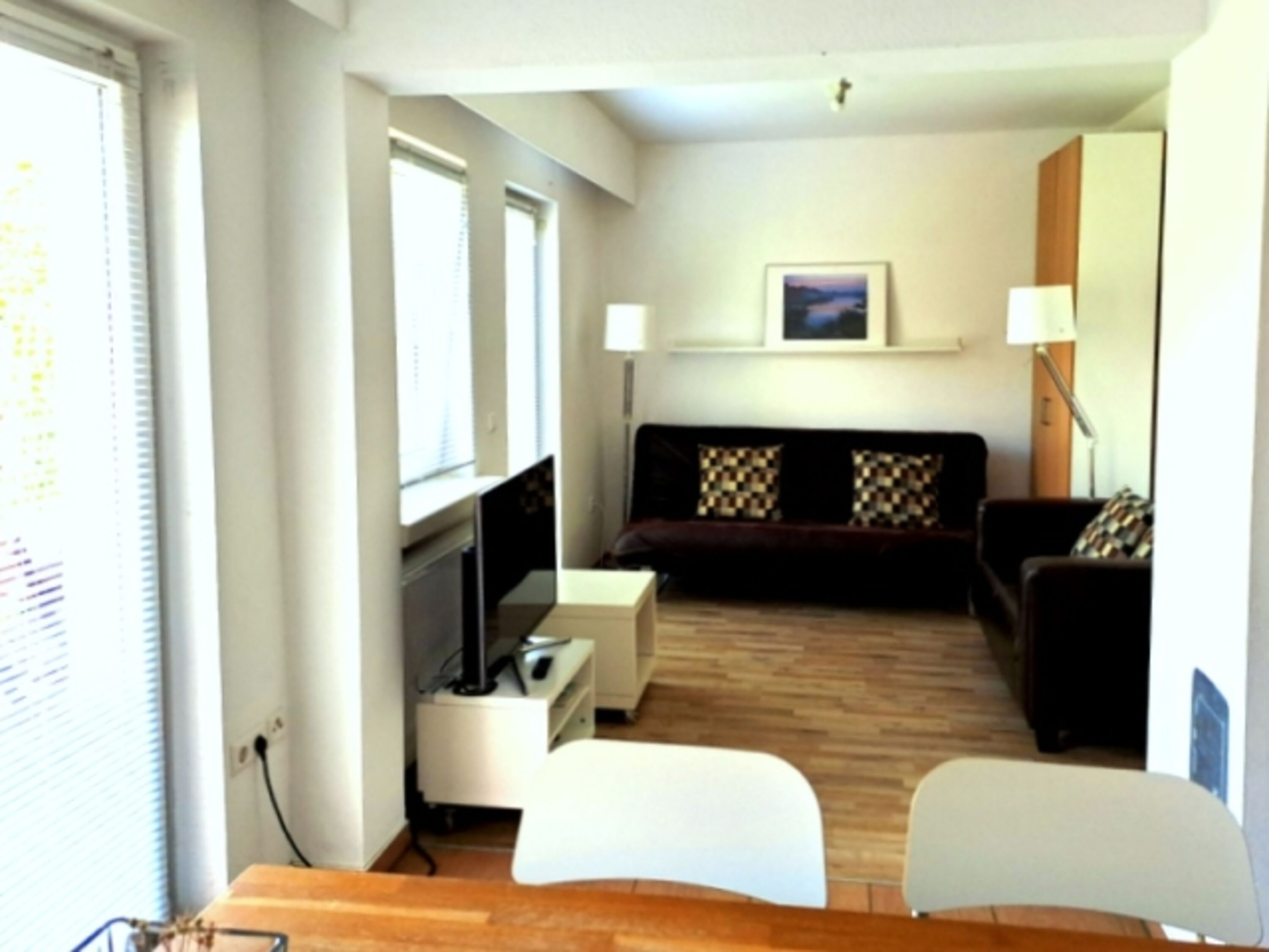 Wohnzimmer mit Ausgang zur Terrasse