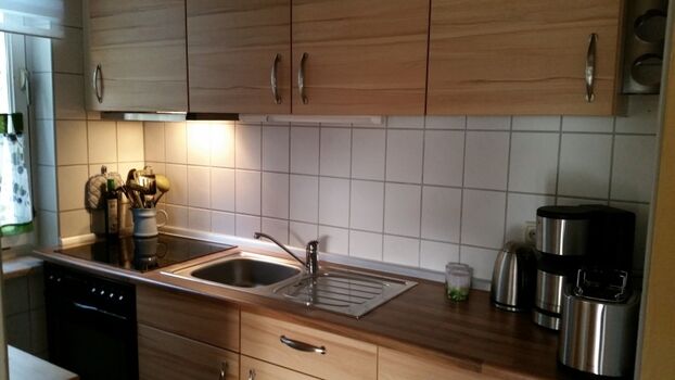 Küche mit Einbauküche