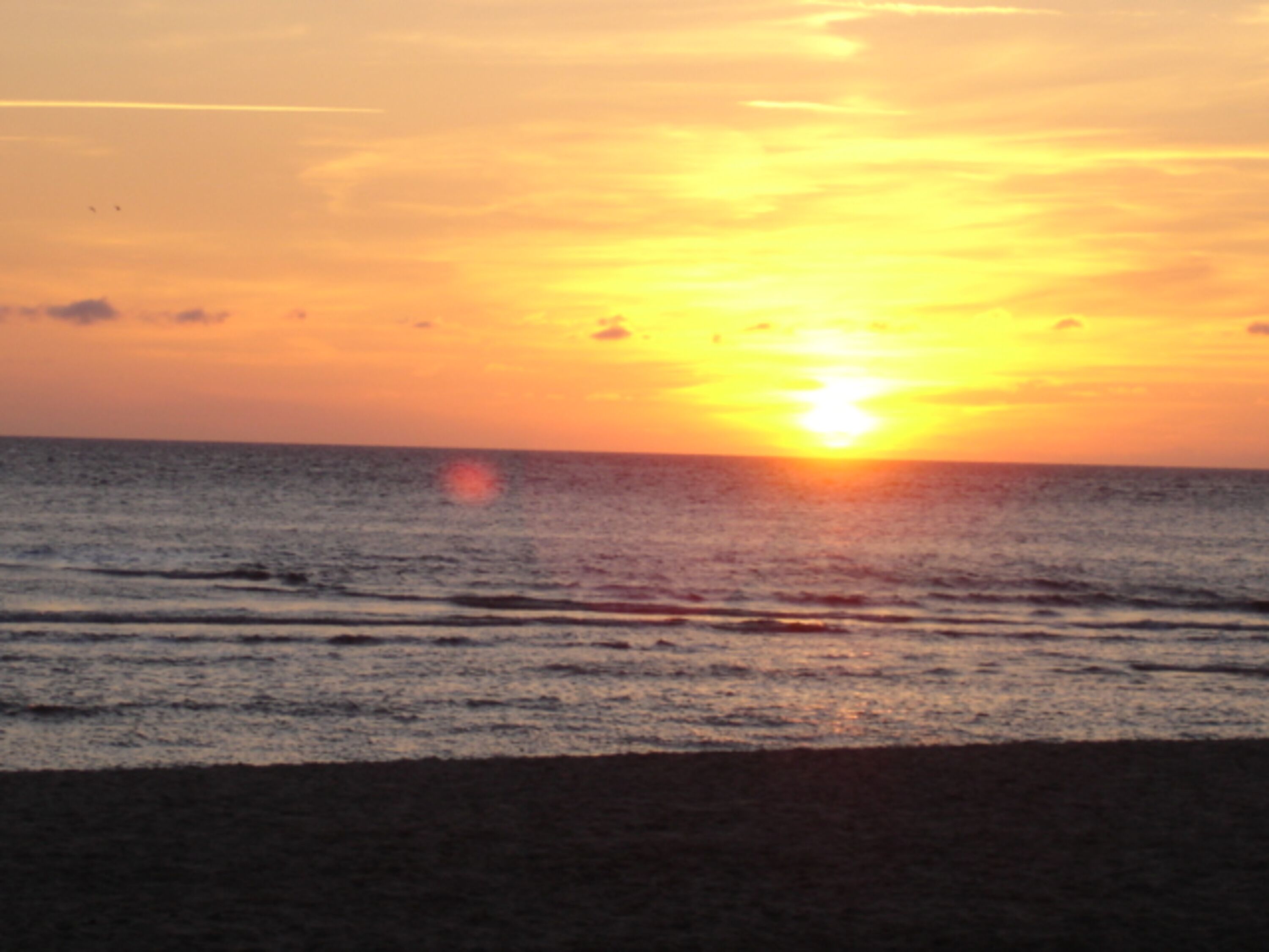 stimmungsvolle Sonnenuntergänge über dem Meer