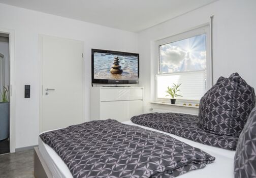 Schlazimmer 2 mit angrenzendem Bad