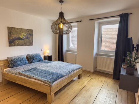 1. Schlafzimmer mit King-Size Bett