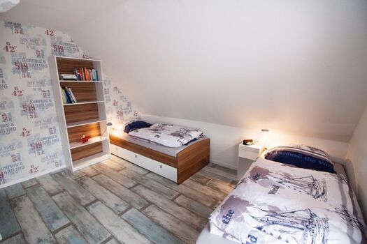 Schlafzimmer mit Einzelbetten