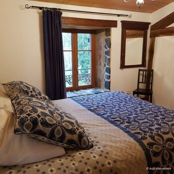 Schlafzimmer mit Blick auf den Garten