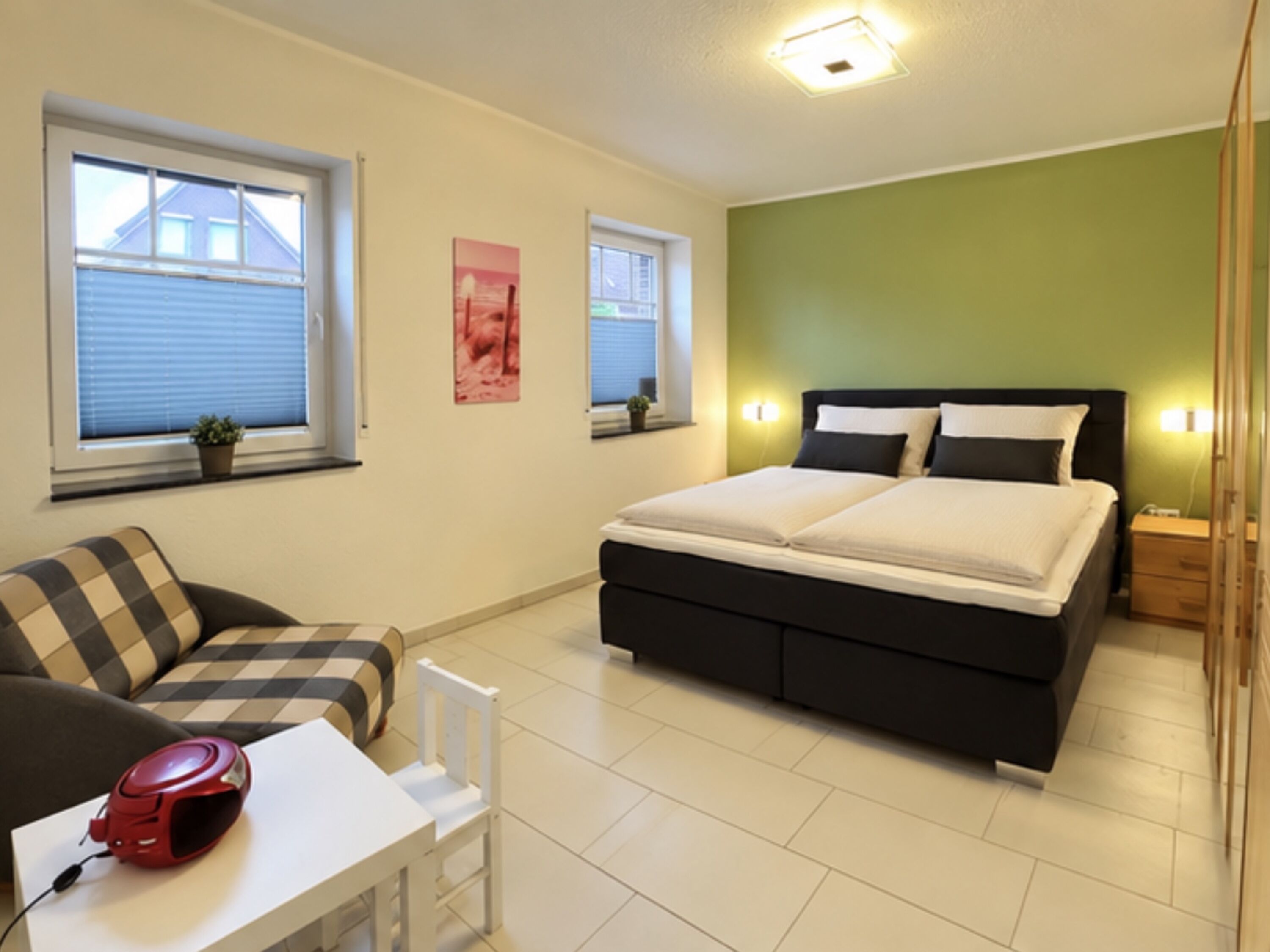 Schlafzimmer mit Spielecke