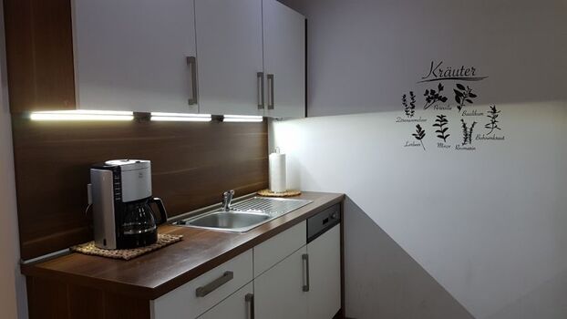 komplett ausgestattete Küche