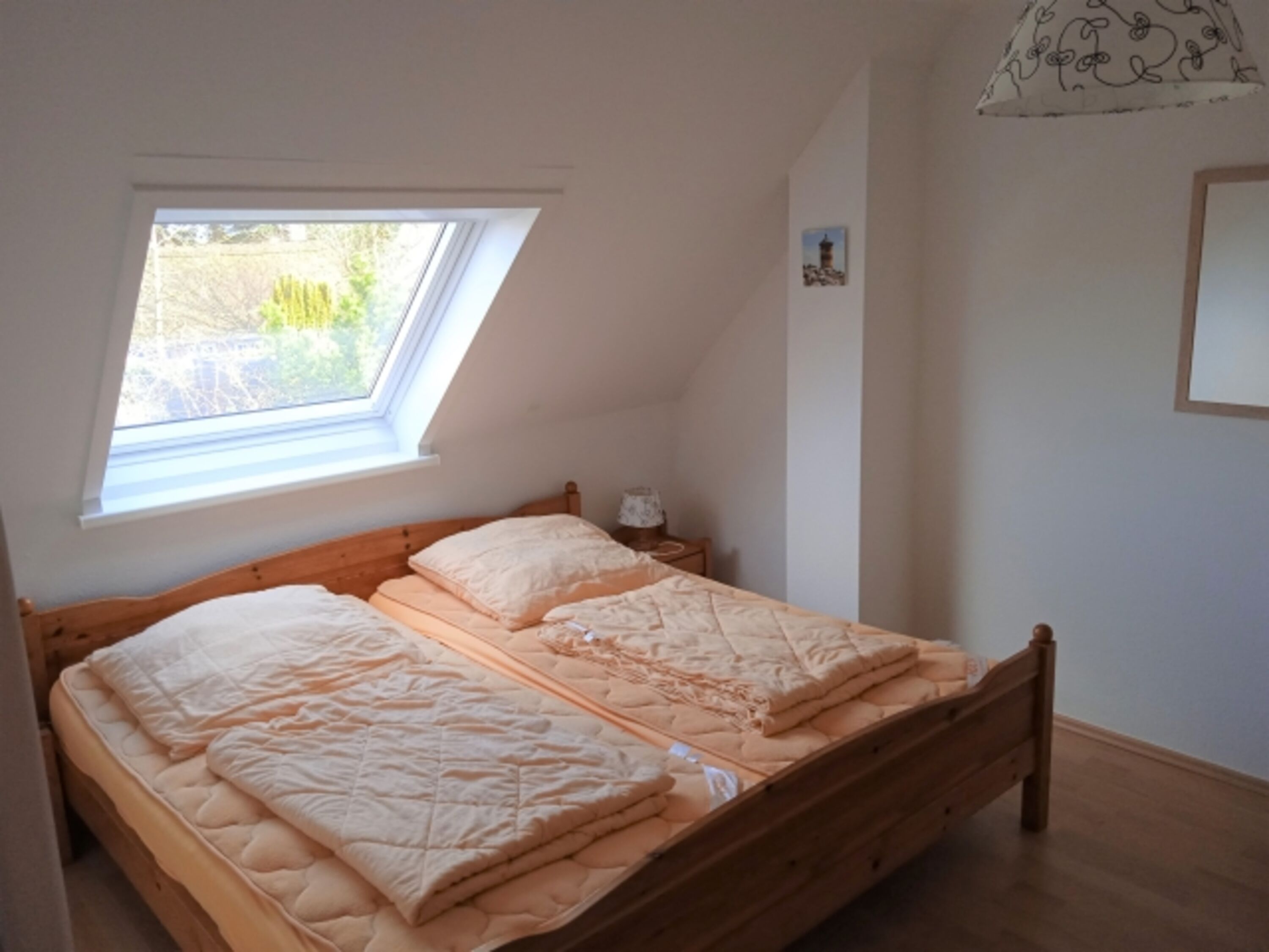 Schlafzimmer 1 mit Doppelbett im OG