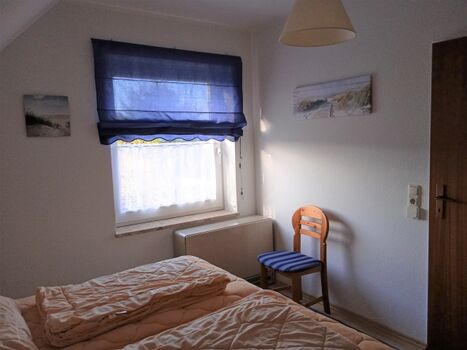 Schlafzimmer 1 mit Doppelbett im 1. Stock