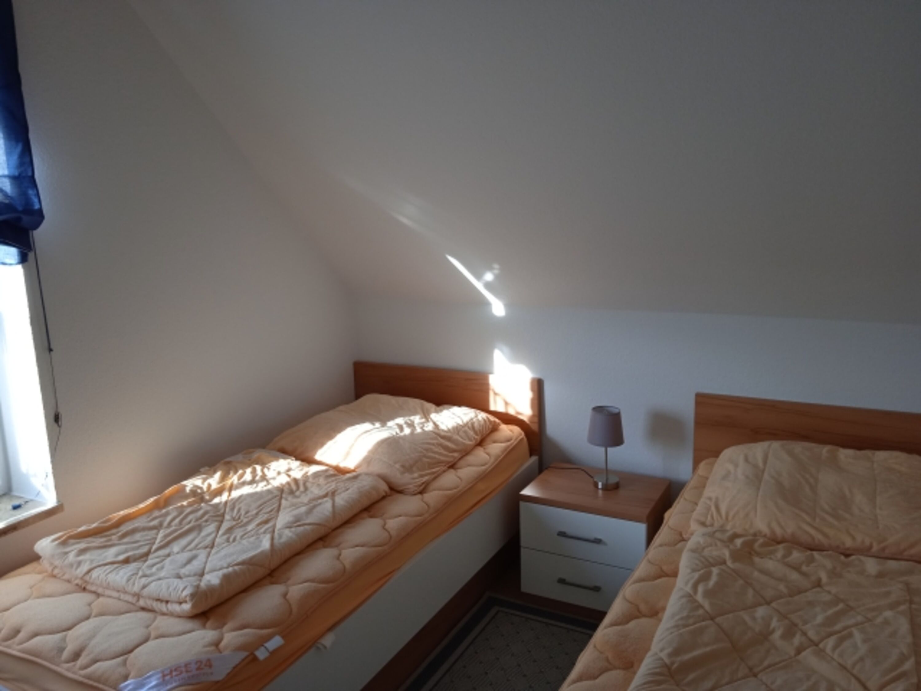 Schlafzimmer 2 mit 2 Einzelbetten im 1. Stock