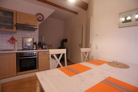 der Eßbereich mit Kamin