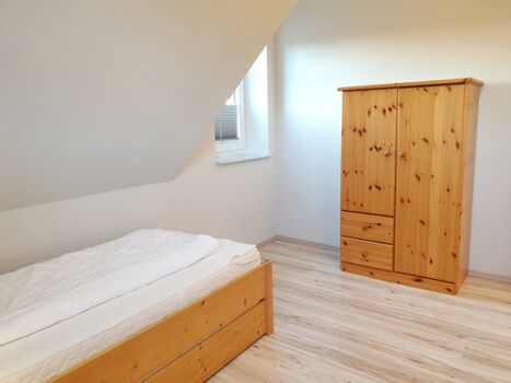 Dreibettzimmer mit Etagenbett