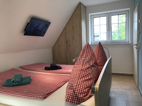 Schlafzimmer mit Doppelbett