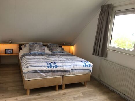 Schlafzimmer mit 3 Betten