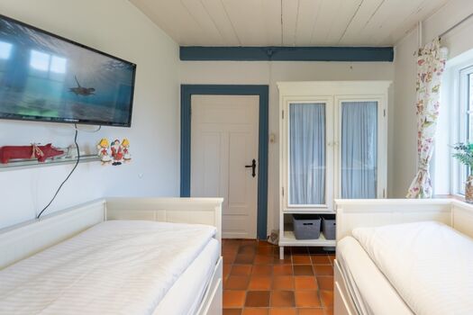 Juwel am Deich - Schlafzimmer mit zwei Einzelbetten im EG