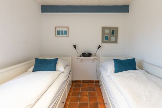 Juwel am Deich - Schlafzimmer mit zwei Einzelbetten im EG