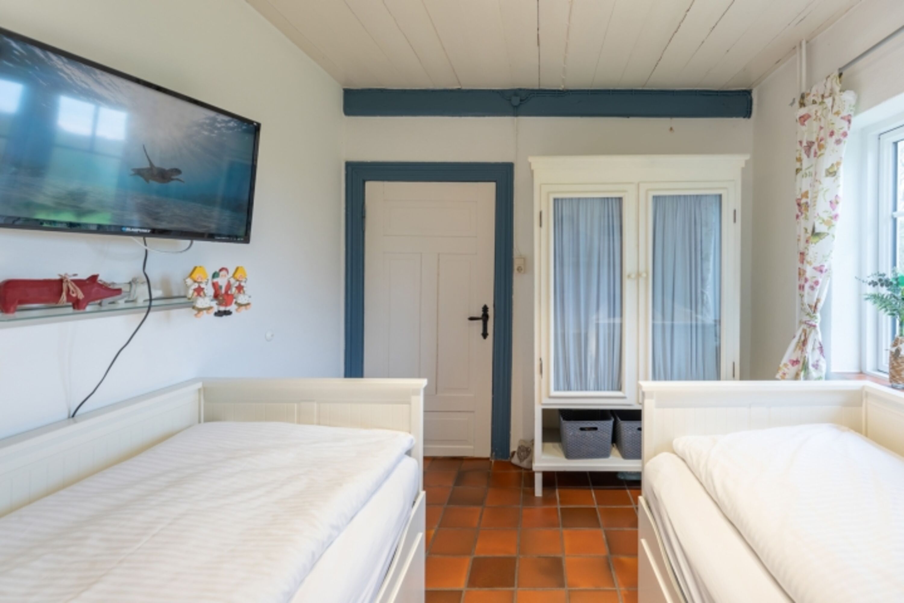 Juwel am Deich - Schlafzimmer mit zwei Einzelbetten im EG