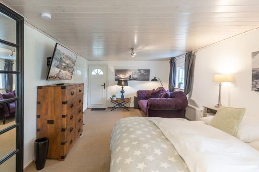 Countryhouse - Schlafzimmer mit behaglicher Sitzecke 