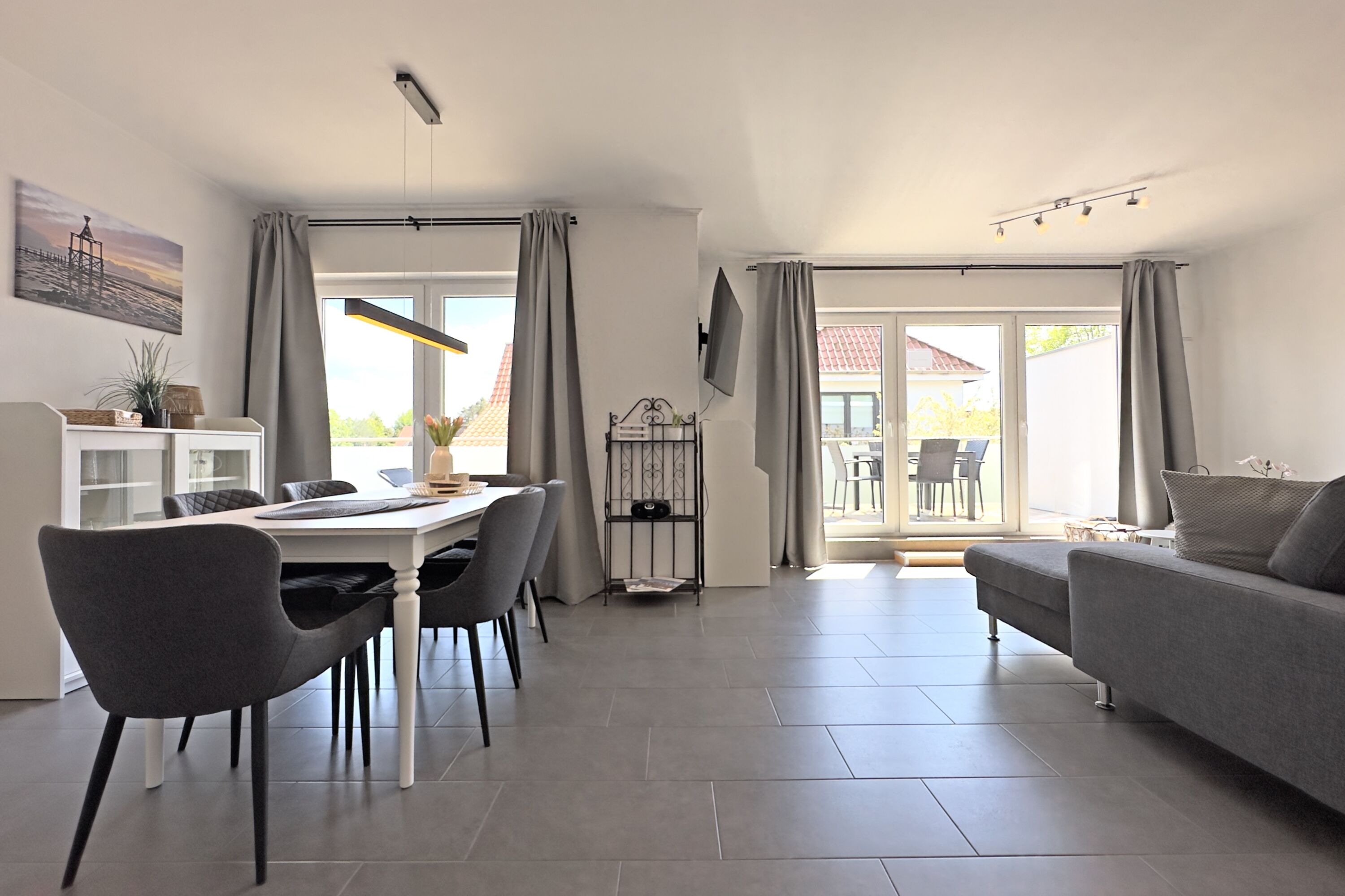 Wohnzimmer mit Essplatz Penthousewohnung Heimathafen