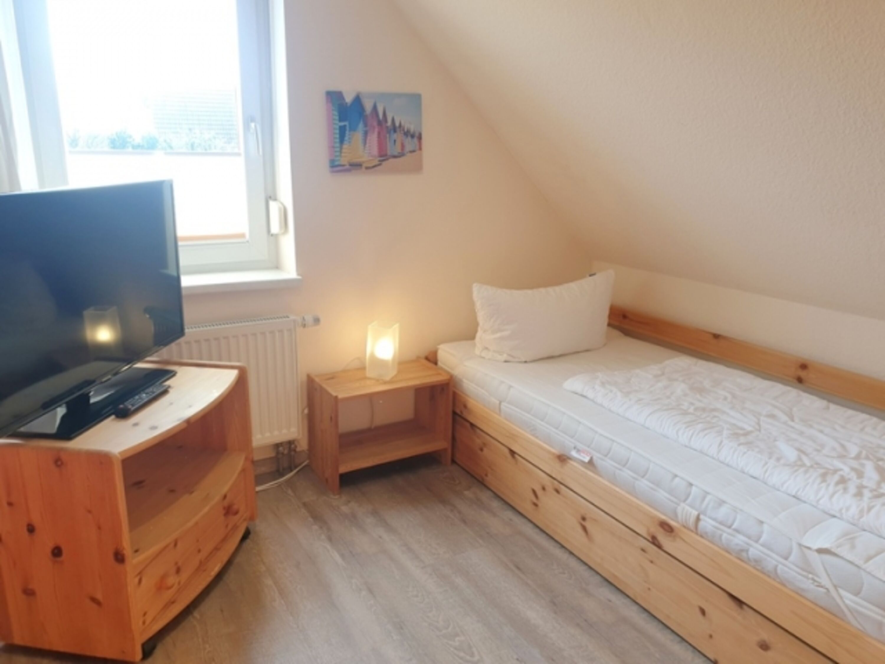 das Einzelbettzimmer