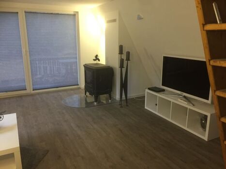 Wohnbereich mit Kamin