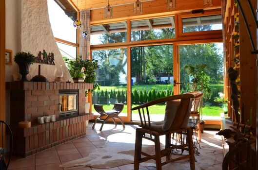 Wintergarten mit Kamin