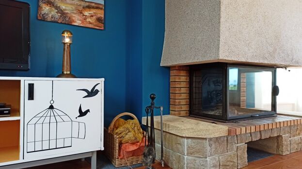 Die TV Ecke mit Kamin