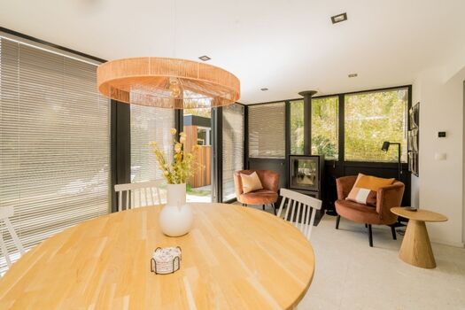 Der wunderschöne Wintergarten mit Kaminofen